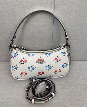 Coach white floral print crescent-shaped underarm bag
